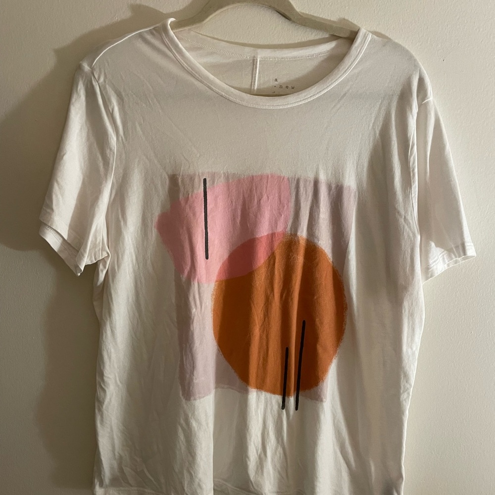 Artsy cream colored t-shirt